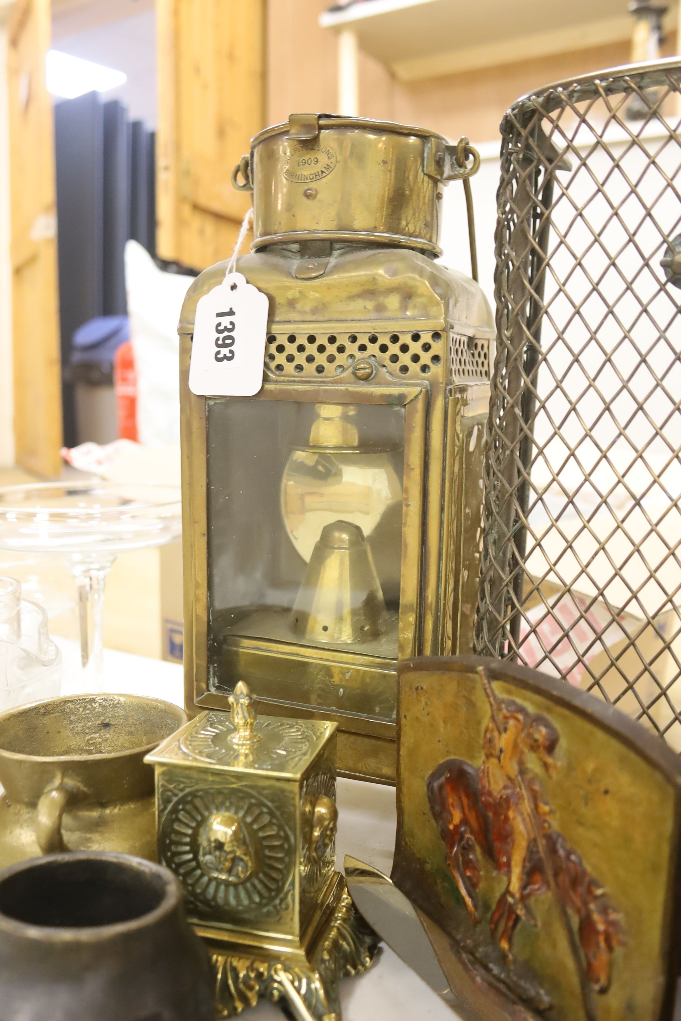 A Victorian brass spit guard, a brass railway lamp, a brass inkwell, a Queen Mary Christmas 1914 cigarette tin, a padlock, etc